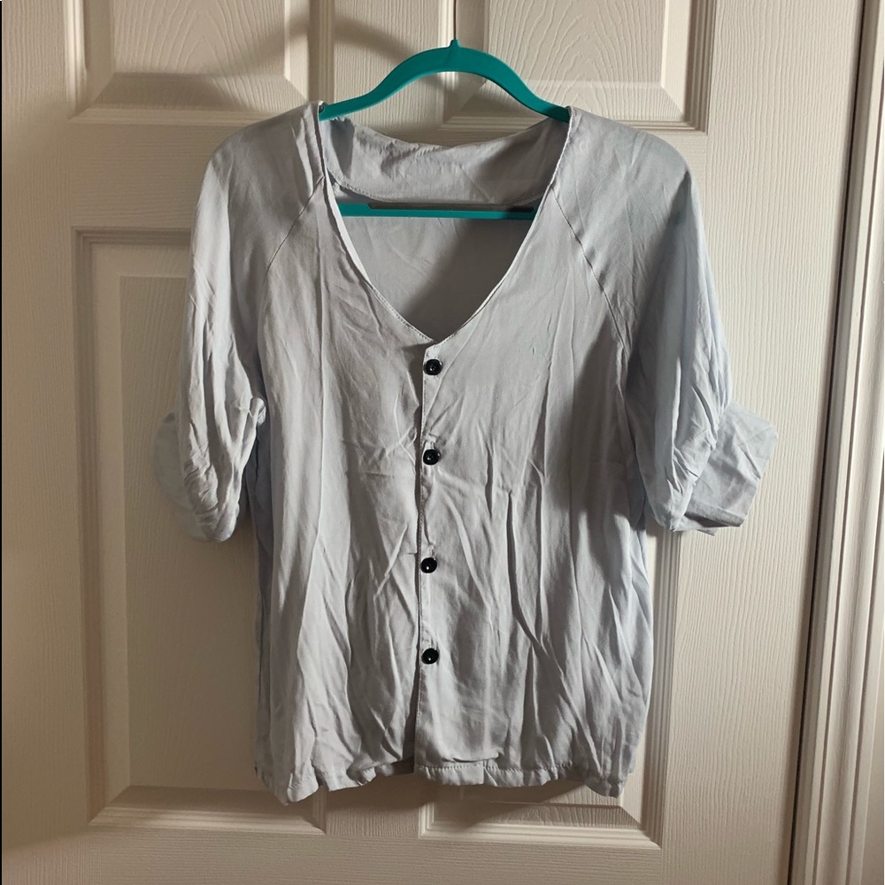 Light blue button down blouse